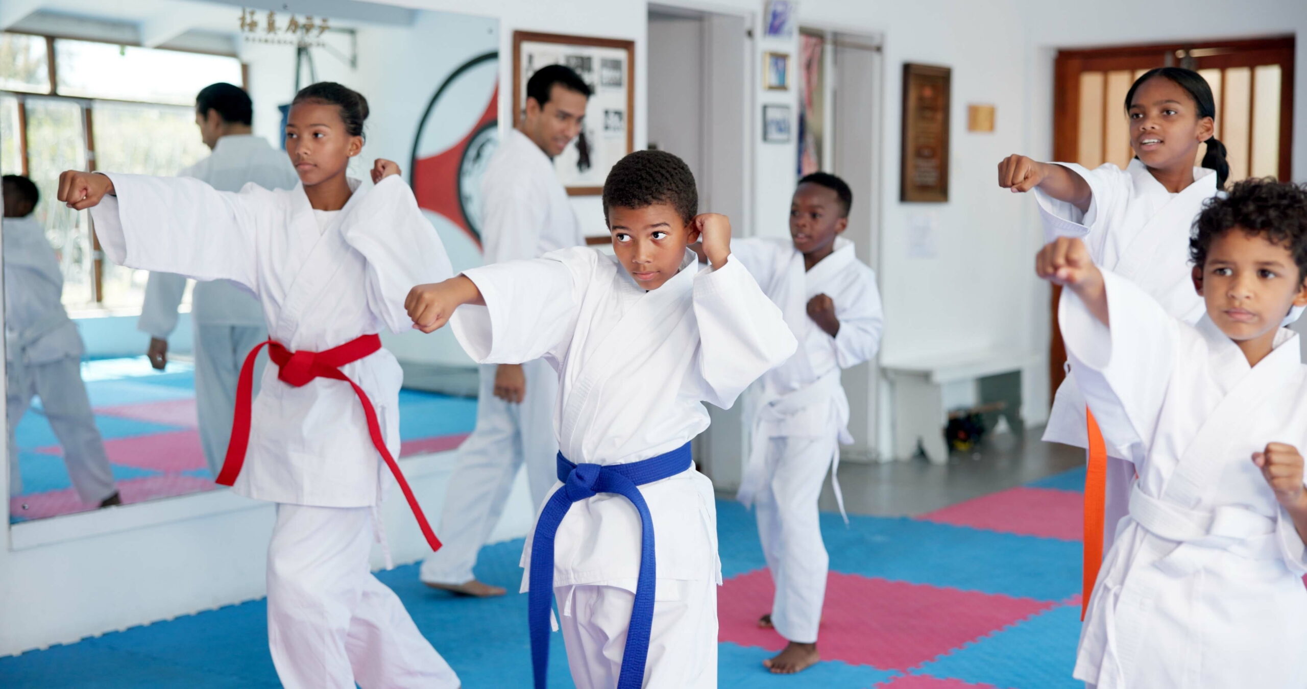 Kids in after school martial arts gym